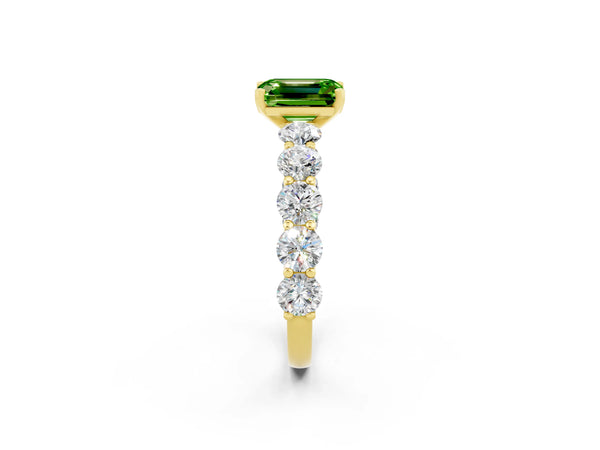 Yellow gold Emerald Cut Peridot Prong Setting with Side Stones on a Pave Band