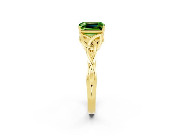 Yellow gold Emerald Cut Peridot Solitaire Engagement Ring with Celtic Knot Band and Four-Prong Setting