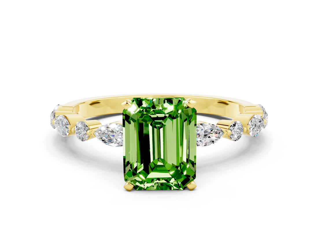 Yellow gold Emerald Cut Peridot Solitaire with Side Stones on a Pavé Band and Four-Prong Setting