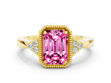 Yellow gold Emerald Cut Pink Sapphire Halo Ring with Tapered Band and Four-Prong Setting