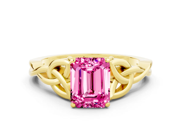 Yellow gold Emerald Cut Pink Sapphire Solitaire Engagement Ring with Celtic Knot Band and Four-Prong Setting