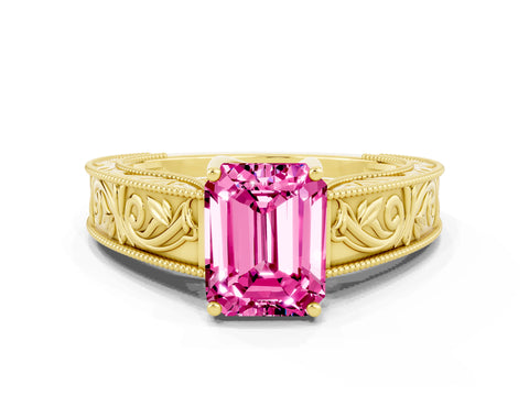 Yellow gold Emerald Cut Pink Sapphire Solitaire Ring with Engraved Band and Four-Prong Setting