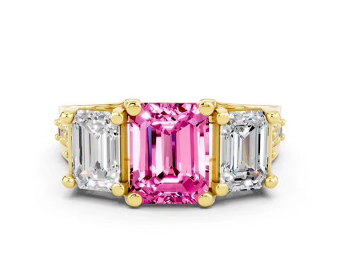 Yellow gold Emerald Cut Pink Sapphire Three-Stone Ring with Channel Set Band and Four-Prong Setting