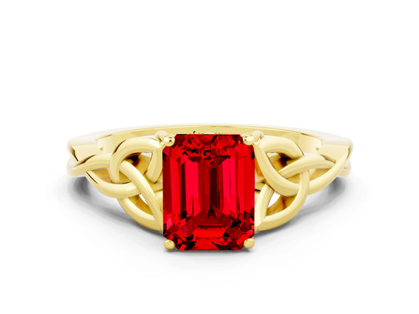 Yellow gold Emerald Cut Ruby Solitaire Celtic Knot Ring with Four-Prong Setting