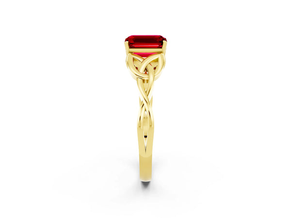Yellow gold Emerald Cut Ruby Solitaire Celtic Knot Ring with Four-Prong Setting
