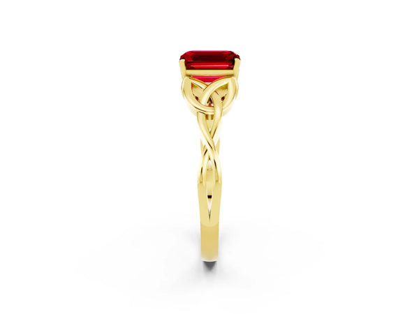 Yellow gold Emerald Cut Ruby Solitaire Engagement Ring with Celtic Knot Band and Four-Prong Setting