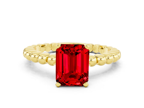 Yellow gold Emerald Cut Ruby Solitaire Ring with Beaded Band and Prong Setting