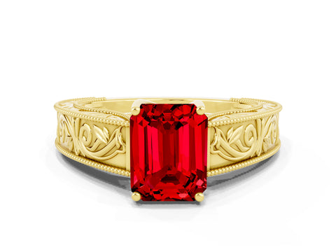 Yellow gold Emerald Cut Ruby Solitaire Ring with Engraved Band and Four-Prong Setting