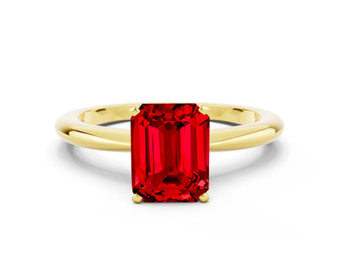 Yellow gold Emerald Cut Ruby Solitaire Ring with Six-Prong Setting and Classic Band
