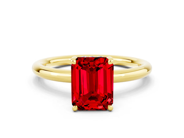 Yellow gold Emerald Cut Ruby Solitaire Ring with Thin Band and Four-Prong Setting