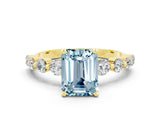 Yellow gold Emerald Cut Solitaire Aquamarine Ring with Pave Band and Four-Prong Setting