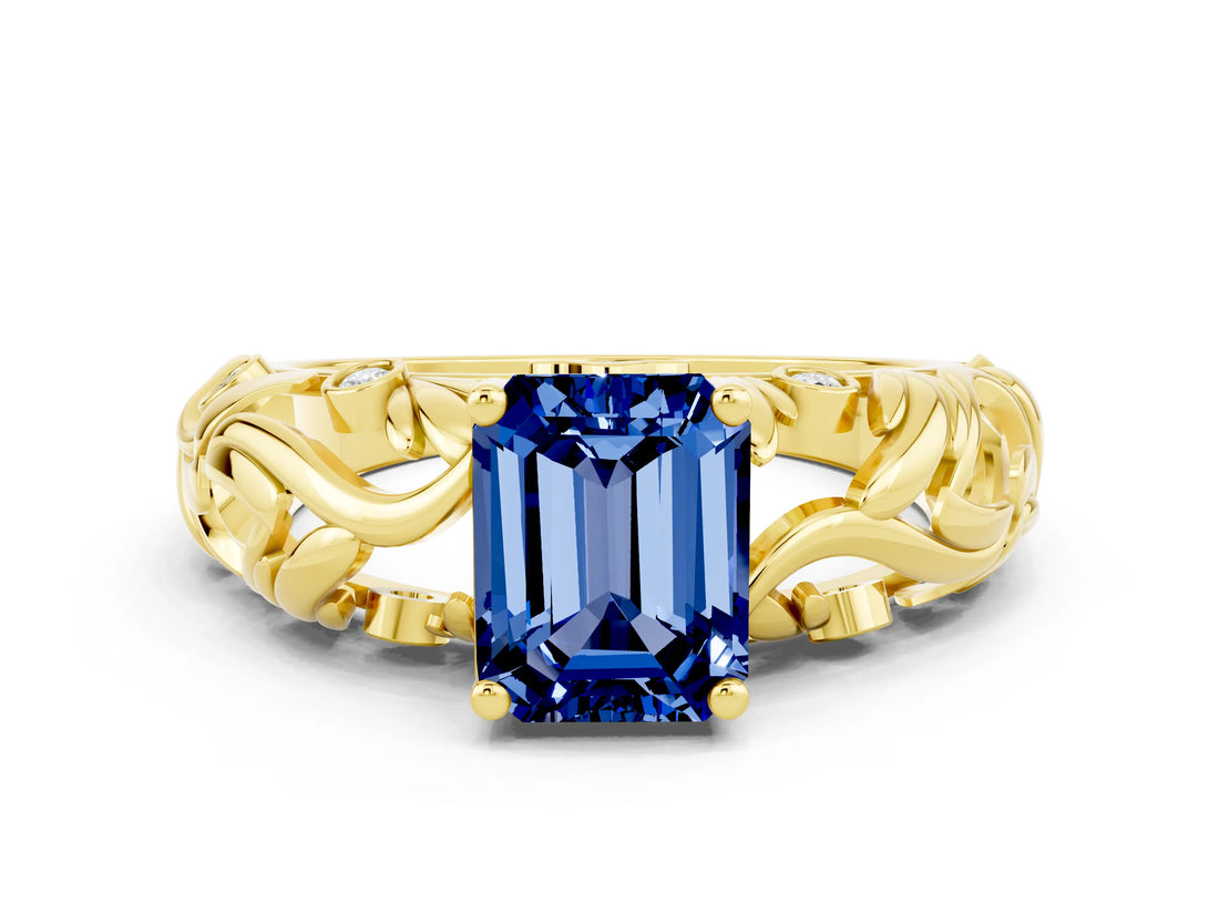 Yellow gold Emerald Cut Solitaire Blue Sapphire Leaf-Inspired Vine Band Ring with Prong Setting