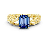Yellow gold Emerald Cut Solitaire Blue Sapphire Leaf-Inspired Vine Band Ring with Prong Setting