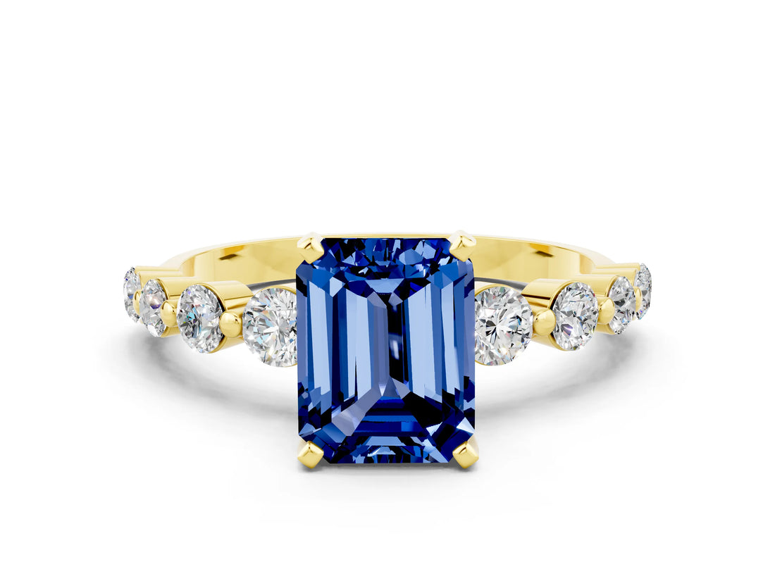 Yellow gold Emerald Cut Solitaire Blue Sapphire Ring with Pave Band and Four-Prong Setting