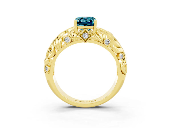 Yellow gold Emerald Cut Solitaire Blue Topaz Leaf-Inspired Vine Band Ring with Prong Setting