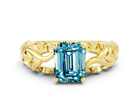 Yellow gold Emerald Cut Solitaire Blue Topaz Leaf-Inspired Vine Band Ring with Prong Setting