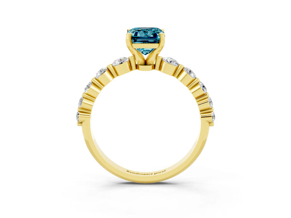 Yellow gold Emerald Cut Solitaire Blue Topaz Ring with Pave Band and Four-Prong Setting