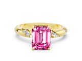 Yellow gold Emerald Cut Solitaire Diamond Engagement Ring with Twisted Pave Band and Four-Prong Setting