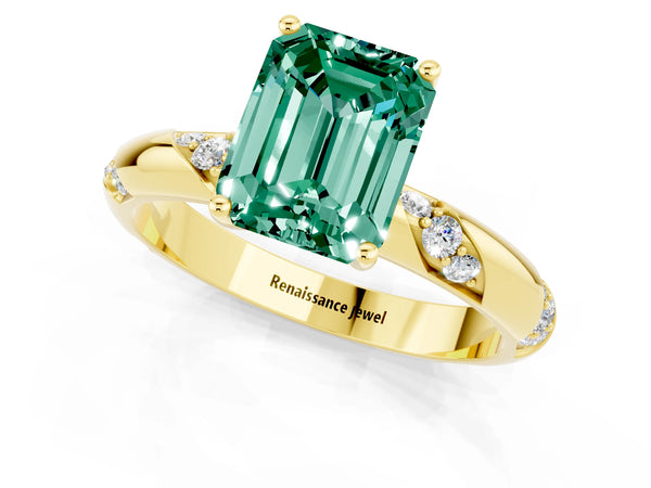 Yellow gold Emerald Cut Green Sapphire Solitaire Engagement Ring with Twisted Round  Accent Band and Prong Setting