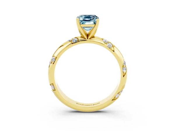Yellow gold Emerald Cut Aquamarine Solitaire Engagement Ring with Twisted Round  Accent Band and Prong Setting