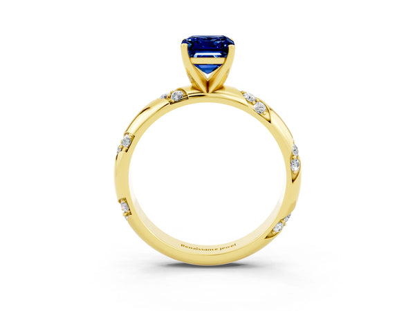 Yellow gold Emerald Cut Blue Sapphire Solitaire Engagement Ring with Twisted Round  Accent Band and Prong Setting