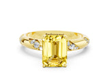 Yellow gold Emerald Cut Solitaire Diamond Engagement Ring with Twisted Pave Band and Four-Prong Setting