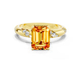 Yellow gold Emerald Cut Solitaire Diamond Engagement Ring with Twisted Pave Band and Four-Prong Setting