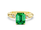 Yellow gold Emerald Cut Solitaire Diamond Engagement Ring with Twisted Pave Band and Four-Prong Setting