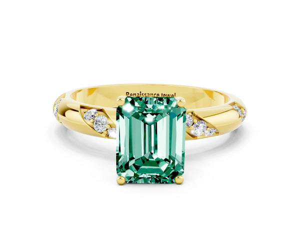 Yellow gold Emerald Cut Green Sapphire Solitaire Engagement Ring with Twisted Round  Accent Band and Prong Setting