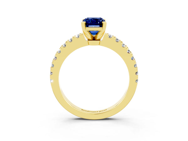 Yellow gold Emerald Cut Solitaire Blue Sapphire with Pavé Band and Four-Prong Setting