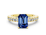 Yellow gold Emerald Cut Solitaire Diamond with Pavé Band and Four-Prong Setting