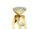 Yellow gold Emerald Cut Solitaire Diamond with Side Stones on Criss-Cross Band and Four-Prong Setting_22