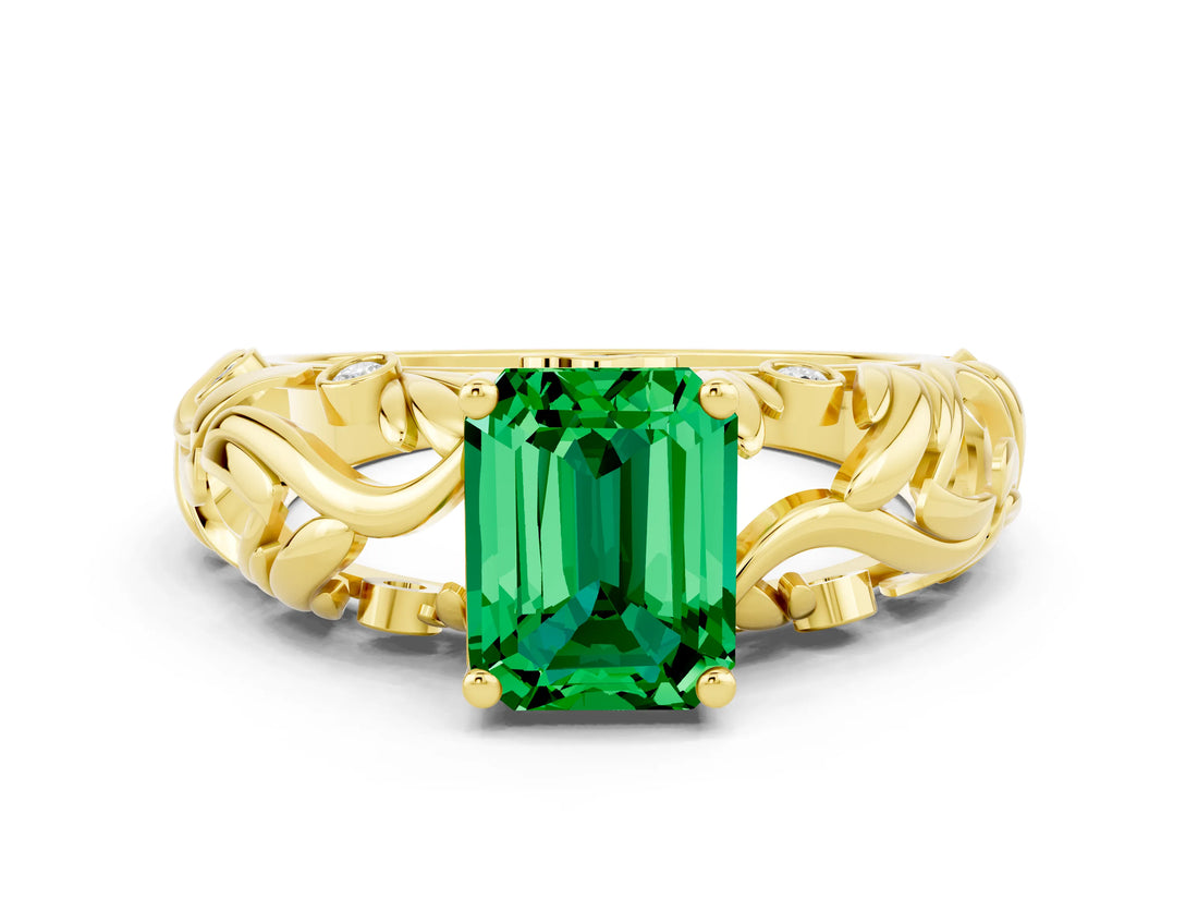 Yellow gold Emerald Cut Solitaire Emerald Leaf-Inspired Vine Band Ring with Prong Setting