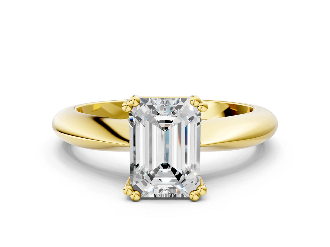 Yellow gold Emerald Cut Solitaire Engagement Ring with Tapered Band and Four-Prong Setting