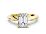 Yellow gold Emerald Cut Solitaire Engagement Ring with Tapered Band and Four-Prong Setting