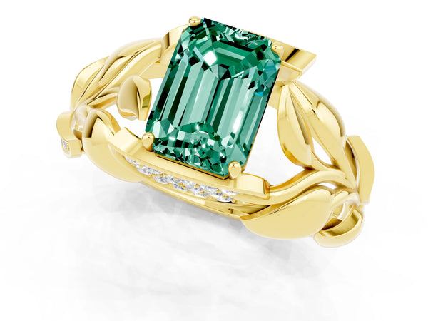Yellow gold Emerald Cut Green Sapphire Leaf-Inspired Engagement Ring with Round Accents and Prong Setting