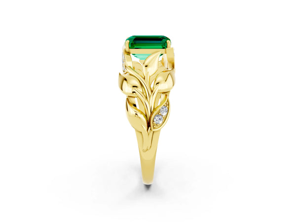 Yellow gold Emerald Cut Emerald Leaf-Inspired Engagement Ring with Round Accents and Prong Setting