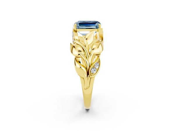 Yellow gold Emerald Cut Aquamarine Leaf-Inspired Engagement Ring with Round Accents and Prong Setting
