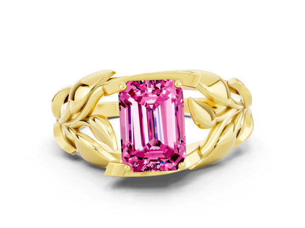 Yellow gold Emerald Cut Pink Sapphire Leaf-Inspired Engagement Ring with Round Accents and Prong Setting