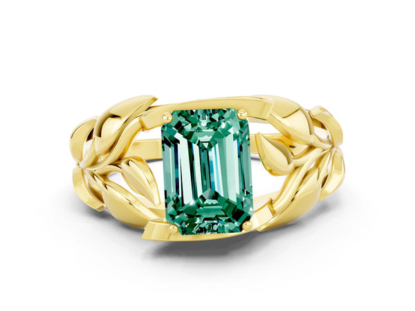 Yellow gold Emerald Cut Green Sapphire Leaf-Inspired Engagement Ring with Round Accents and Prong Setting