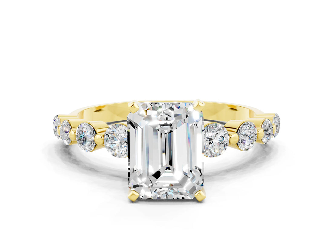 Yellow gold Emerald Cut Solitaire Moissanite Ring with Pave Band and Four-Prong Setting