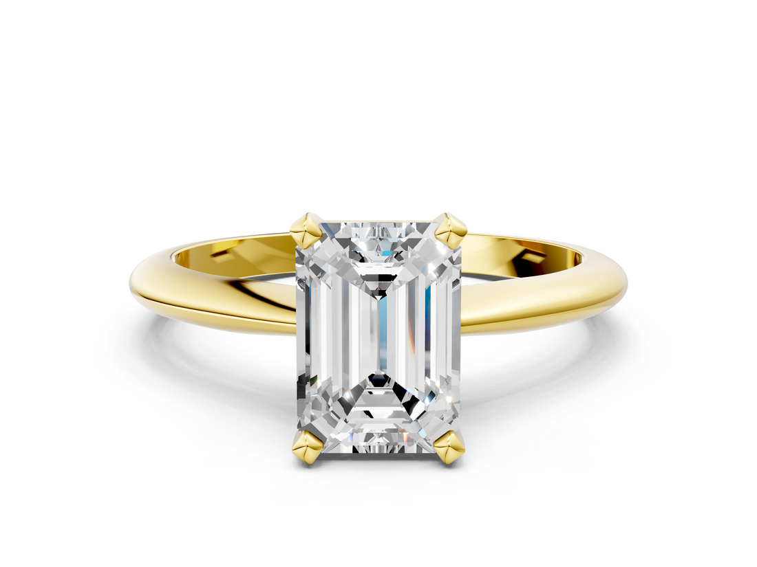 Yellow gold Emerald Cut Solitaire Ring with Four-Prong Setting on a Classic Band_72