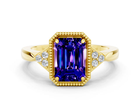 Yellow gold Emerald Cut Tanzanite Halo Ring with Tapered Band and Four-Prong Setting