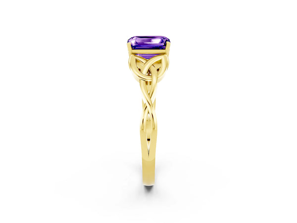 Yellow gold Emerald Cut Tanzanite Solitaire Celtic Knot Ring with Four-Prong Setting