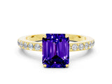 Yellow gold Emerald Cut Tanzanite Solitaire Engagement Ring with Pavé Band and Four-Prong Setting