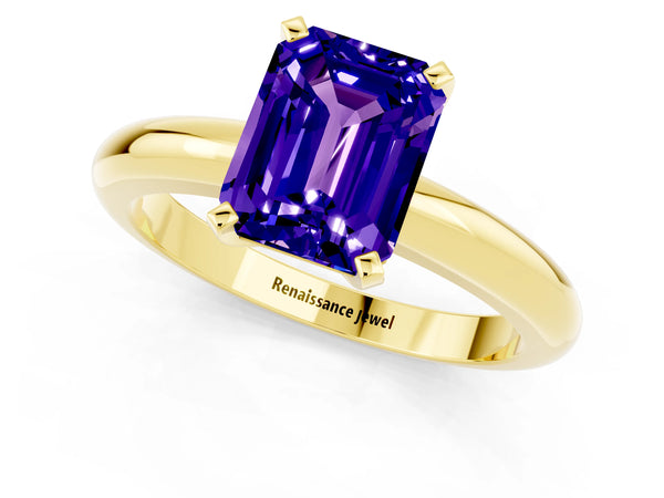 Yellow gold Emerald Cut Tanzanite Solitaire Engagement Ring with Round Band and Four-Prong Setting