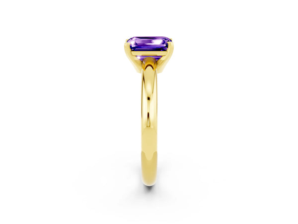 Yellow gold Emerald Cut Tanzanite Solitaire Engagement Ring with Round Band and Four-Prong Setting
