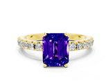 Yellow gold Emerald Cut Tanzanite Solitaire Pavé Band with Four-Prong Setting