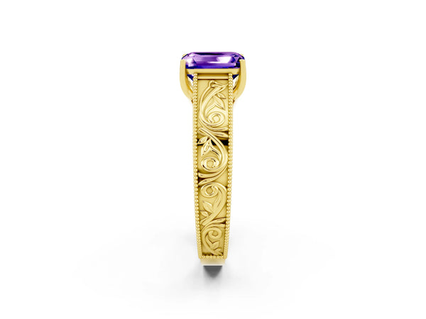 Yellow gold Emerald Cut Tanzanite Solitaire Ring with Engraved Band and Four-Prong Setting