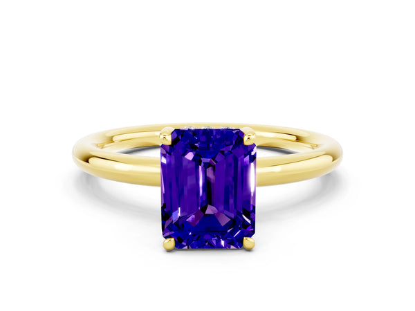 Yellow gold Emerald Cut Tanzanite Solitaire Ring with Thin Band and Four-Prong Setting